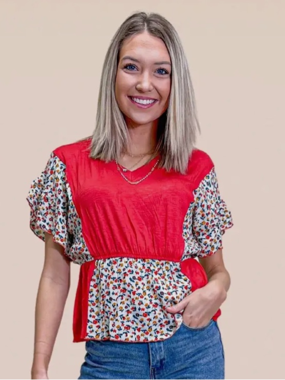 Red V-Neck Peplum Top with Floral Panels
Size M